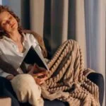 Home Sensory Oasis - Women in chair with blanket