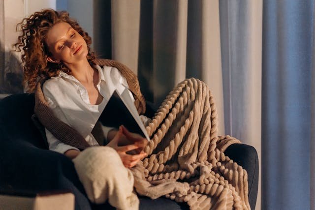 Home Sensory Oasis - Women in chair with blanket