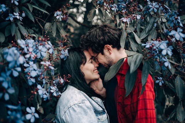 Fibro Love - Couple surrounded by tree blossoms